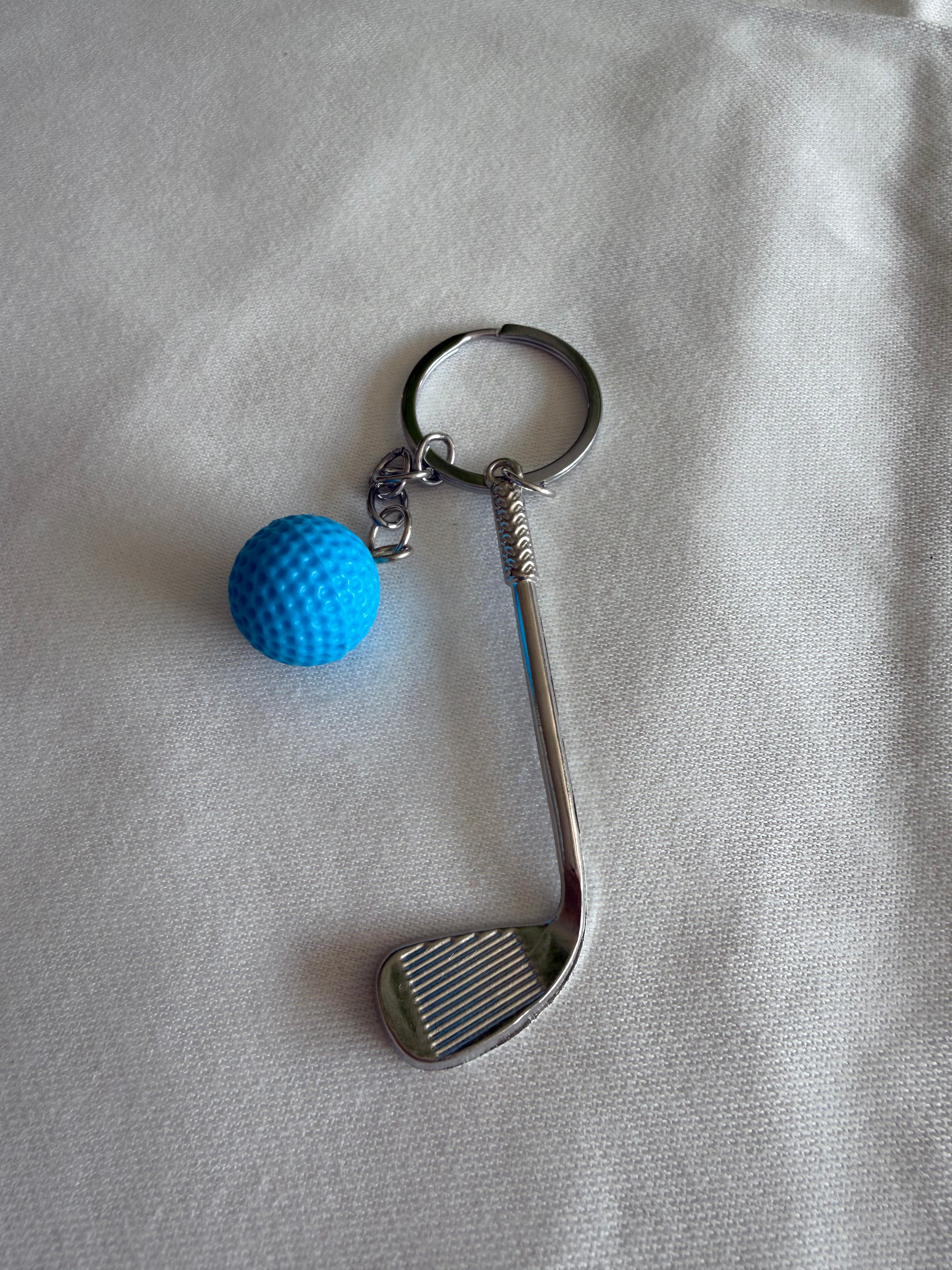 Schlüsselanhänger mit kleinem Golfball und Schläger